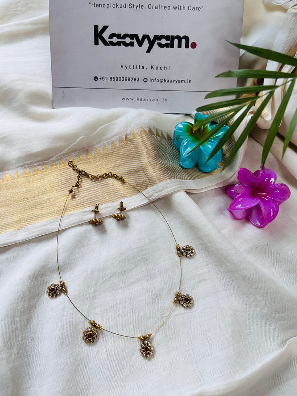 Invisible Ad Charm Neckpiece & Earrings